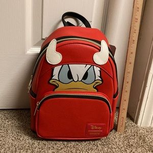 Loungefly Disney mini backpack Devil glow in the dark horns Donald Duck NWT LE